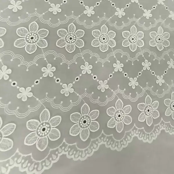 Tissu d'œillets de broderie en dentelle en coton blanc pour robe